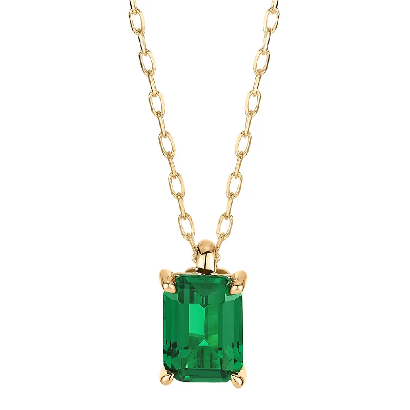 gold choker necklace for women-Emerald Cut solitaire pendant with emerald simulant in 10 carat yellow gold