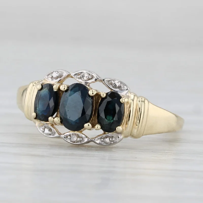 nature-inspired engagement rings for women-1.10ctw Blue Sapphire Oval 3-Stone Ring 10k Yellow Gold Diamond Accents Size 7.5