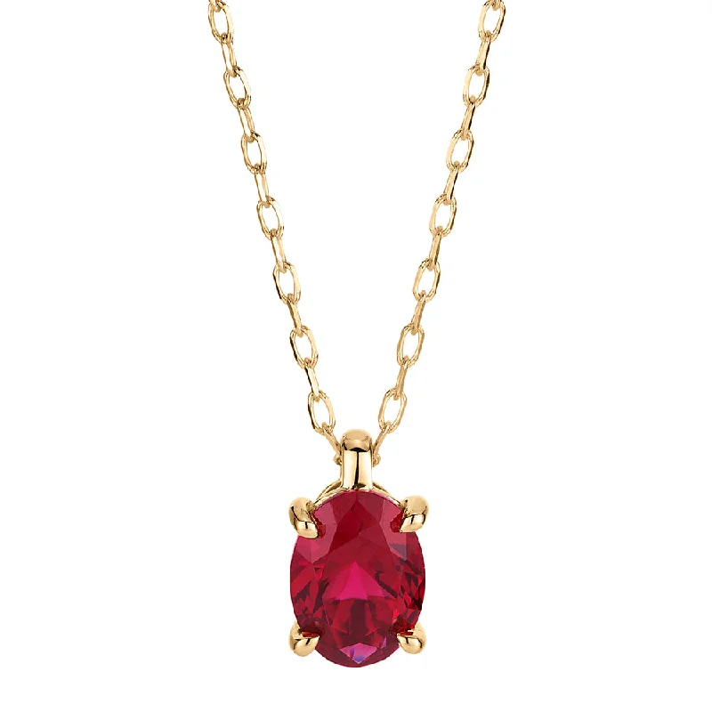 classic diamond necklace for women-Oval solitaire pendant with ruby simulant in 10 carat yellow gold